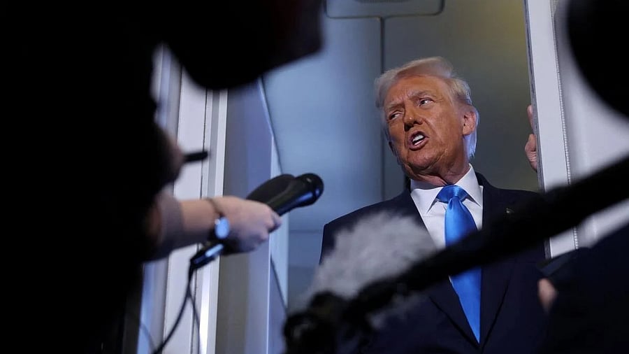 <div class="paragraphs"><p>US President Donald Trump speaks to members of the media on board Air Force One en route to South Korea.</p></div>