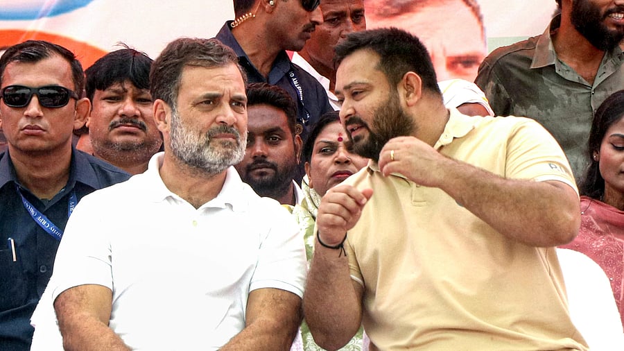 <div class="paragraphs"><p>LoP in the Lok Sabha and Congress leader Rahul Gandhi with RJD leader Tejashwi Yadav during a public meeting ahead of the Bihar Assembly elections, in Muzaffarpur, Bihar, Wednesday</p></div>