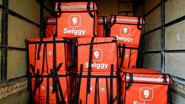 <div class="paragraphs"><p>Swiggy delivery bags are stored inside a truck in Mumbai. (Representative image)</p></div>