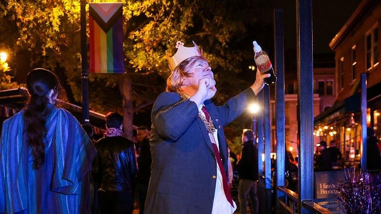<div class="paragraphs"><p>A person dressed as U.S. President Donald Trump with prop boxes representing the Epstein files dances after the annual pre-Halloween 17th Street High Heel Race in Washington, D.C., U.S.</p></div>