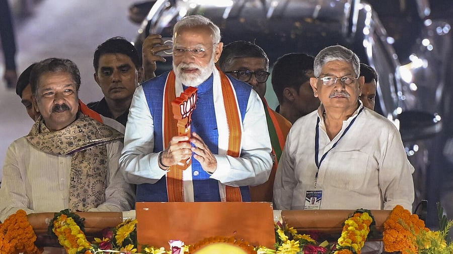 <div class="paragraphs"><p>Prime Minister Narendra Modi, center, Union Minister Rajiv Ranjan alias Lalan Singh, right, and Bihar BJP President Dilip Kumar Jaiswal during an election roadshow for the Bihar Assembly polls, in Patna, Sunday, Nov. 2, 2025.</p></div>