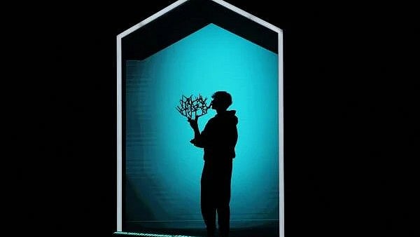 <div class="paragraphs"><p>Italy's Jannik Sinner poses with the trophy after winning the Paris Masters final against Canada's Felix Auger-Aliassime</p></div>