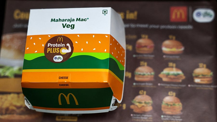 <div class="paragraphs"><p>A Maharaja Mac vegetarian burger package  is placed on a tray, at a McDonald's restaurant in Mumbai.</p></div>