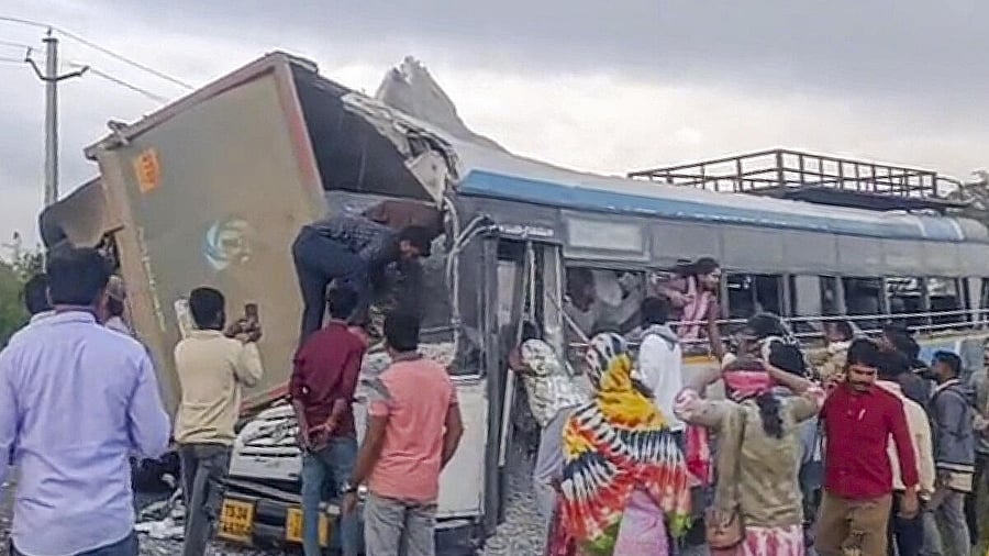 <div class="paragraphs"><p>Rescue work underway after a tipper lorry carrying gravel collided head-on with a public transport bus, near Chevella in Ranga Reddy district, Telangana</p></div>