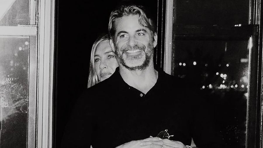 <div class="paragraphs"><p>Jennifer Aniston with Jim Curtis. </p></div>