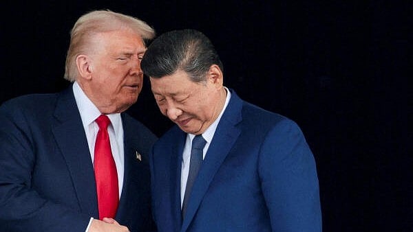<div class="paragraphs"><p>US President Donald Trump (L) and Chinese President Xi Jinping.</p></div>