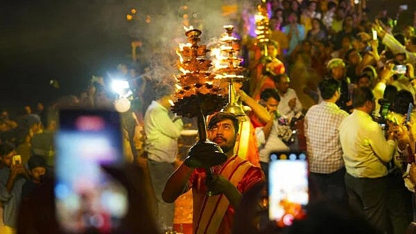 <div class="paragraphs"><p>Priests perform the Yamuna aarti at Vasudev Ghat on the occasion of Kartik Purnima, in New Delhi.</p></div>