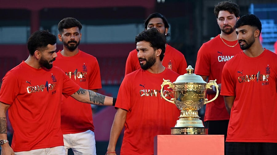 <div class="paragraphs"><p>RCB skipper Rajat Patidar (centre) with Virat Kohli and others during IPL title winning celebrations. <br></p></div>