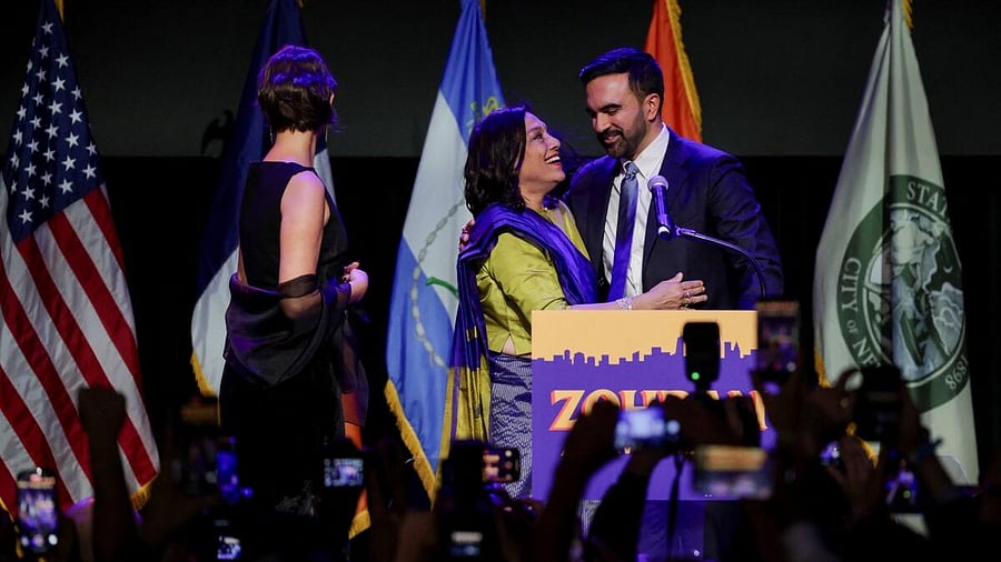 <div class="paragraphs"><p>Democratic candidate for New York City mayor Zohran Mamdani hugs his mother Mira Nair as his wife Rama Duwaji stands next to them, after Mamdani won the 2025 New York City Mayoral race, at an election night rally in the Brooklyn borough of New York City.</p></div>