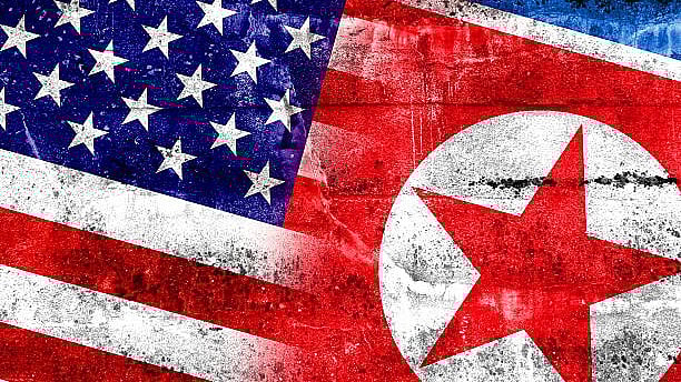 <div class="paragraphs"><p>Flags of US and North Korea.</p></div>