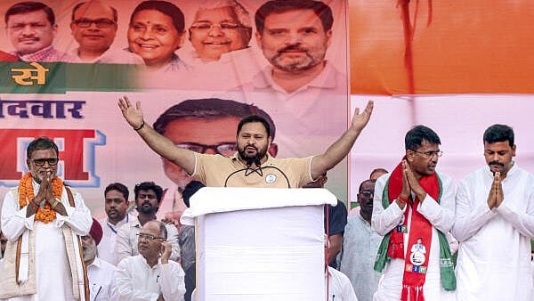 <div class="paragraphs"><p>RJD leader Tejashwi Yadav addresses a rally</p></div>