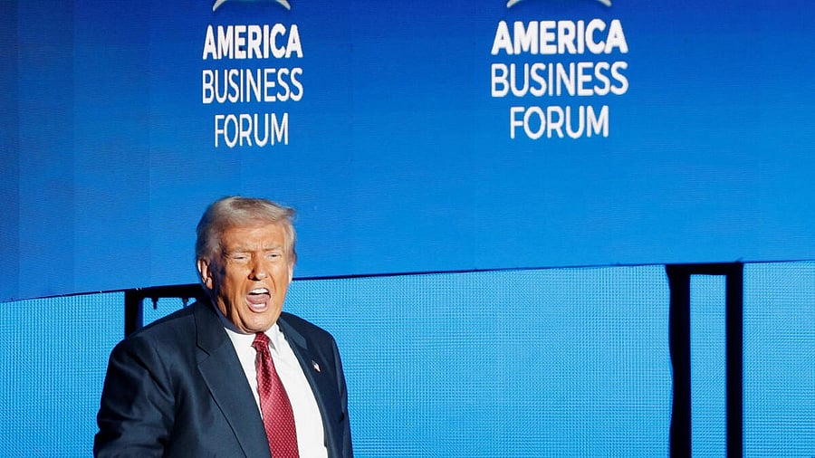 <div class="paragraphs"><p>US President Donald Trump speaks to the audience after delivering remarks at the America Business Forum in Miami, Florida, US.</p></div>