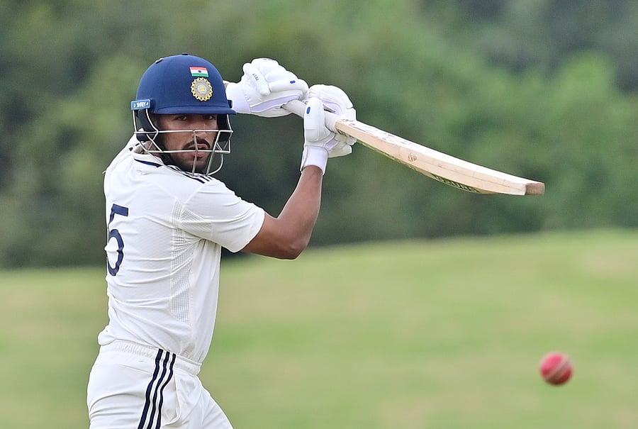 India A's Dhruv Jurel drives one to the fence during his unbeaten 132 on the opening day of their four-day game against South Africa A at BCCI's CoE in Bengaluru on Thursday. DH Photo/ Prashanth HG