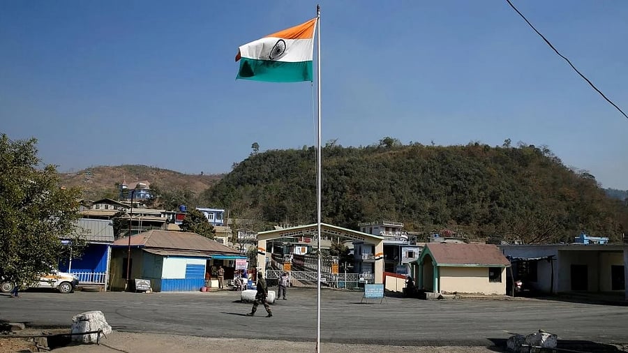 <div class="paragraphs"><p>An Indian national flag flies next to an immigration check post on the India-Myanmar border in Zokhawthar village. Image for representational purposes.</p></div>