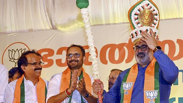 <div class="paragraphs"><p>BJP Kerala President Rajeev Chandrasekhar with former state president K Surendran and Minister of State for Fisheries George Kurian.</p></div>