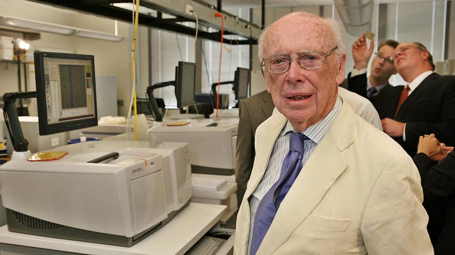 <div class="paragraphs"><p>James D. Watson, co-discoverer of the DNA helix and father of the Human Genome Project, stands inside a laboratory at the Baylor College of Medicine's Human Genome Sequencing Center in Houston.</p></div>