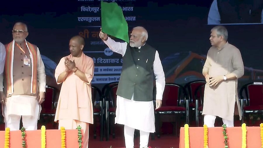 <div class="paragraphs"><p>In this screengrab from a video posted on Nov. 8, 2025, Prime Minister Narendra Modi flags off Vande Bharat Express trains at the railway station, in Varanasi. Union Railways Minister Ashwini Vaishnaw and Uttar Pradesh Chief Minister Yogi Adityanath are also seen.</p></div>