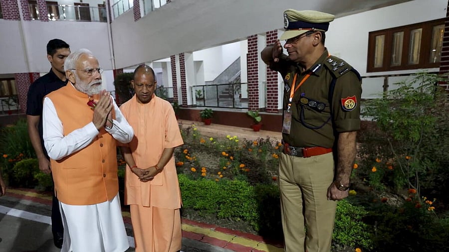 <div class="paragraphs"><p>Prime Minister Narendra Modi with Uttar Pradesh Chief Minister Yogi Adityanath upon his arrival at a guest house, in Varanasi. Credit: PTI</p></div>