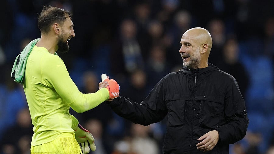 <div class="paragraphs"><p>Premier League - Manchester City v Liverpool - Etihad Stadium, Manchester, Britain - November 9, 2025 Manchester City manager Pep Guardiola celebrates with Manchester City's Gianluigi Donnarumma after the match. </p></div>