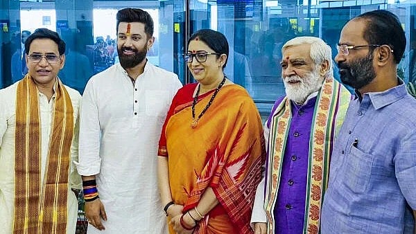 <div class="paragraphs"><p>Union Minister and Lok Janshakti Party (Ram Vilas) leader Chirag Paswan with BJP leaders Smriti Irani and Dinesh Lal Yadav on the eve of the second phase of voting in the Bihar Assembly elections, in Patna. Credit: PTI</p></div>