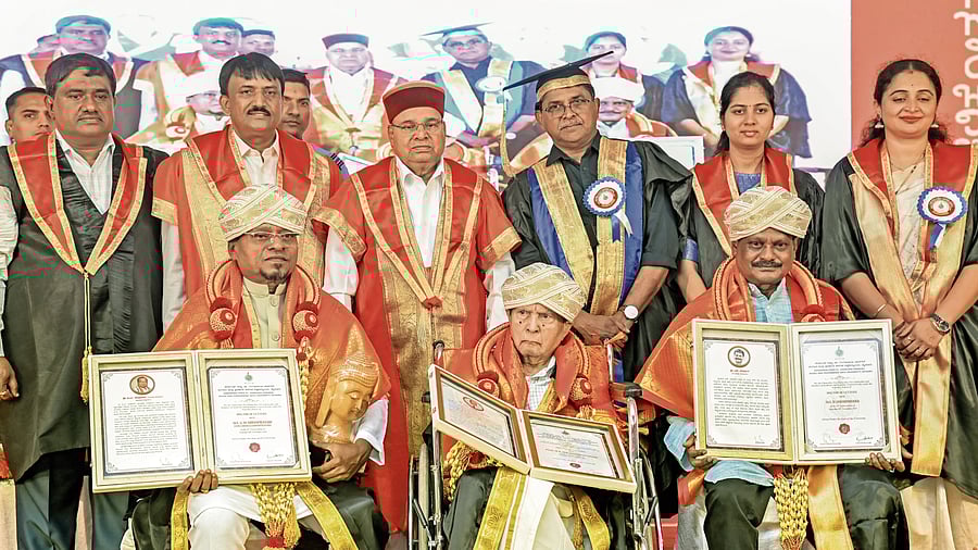 <div class="paragraphs"><p>Governor Thaawarchand Gehlot, Vice Chancellor of Kalamandalam University, Kerala,B Ananthakrishnan and KSGHMPA University VC Nagesh V Bettakote, during the 10th Annual Convocation of Karnataka State Gangubhai Hanagal Music and Performing Arts University in Mysuru on Saturday. Honorary Doctor of Letters presented to Prof B R Sheshadri (Music and Sanksrit), H Janardhana (Theatre artist) and G M Shivaprasad. </p></div>