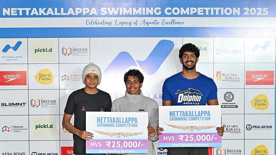 <div class="paragraphs"><p>Most Valuable Swimmers of Nettakallappa Swimming Championship (from left) Trisha S Sindhu, Dhinidhi Desinghu (female - both tied with four gold) and Srihari Nataraj (male - 3 gold, 1 silver) pose with their spoils at the Nettakallappa Aquatic Centre in Bengaluru.</p></div>
