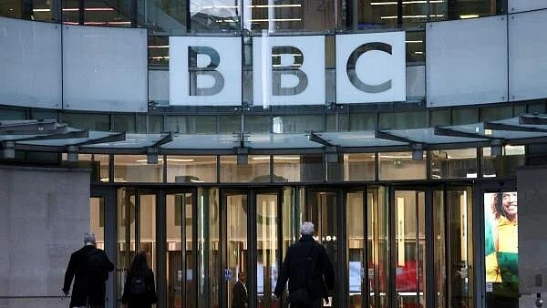 <div class="paragraphs"><p>People walk outside BBC Broadcasting House after Director General of BBC Tim Davie and Chief Executive of BBC News Deborah Turness resigned following accusations of bias at the British broadcaster, including in the way it edited a speech by US President Donald Trump, in London, Britain.</p></div>