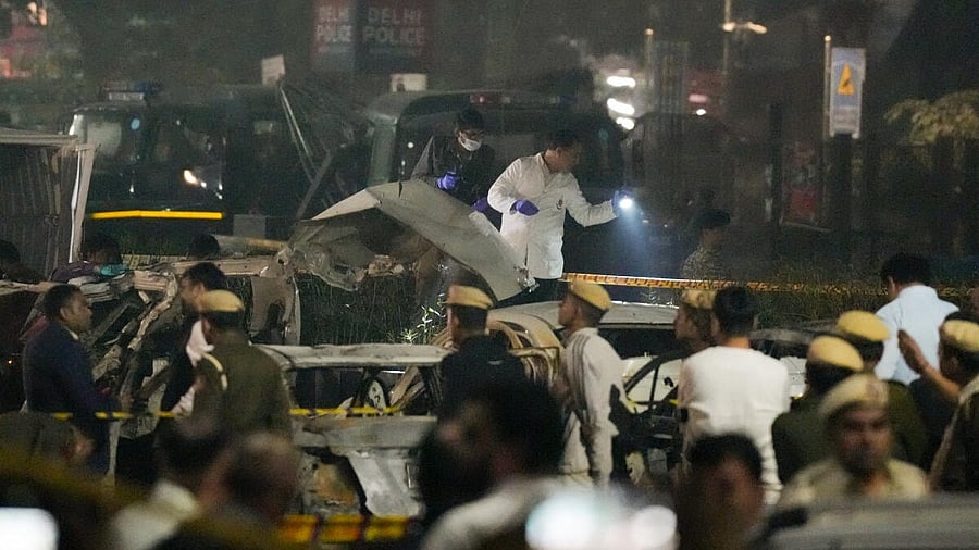 <div class="paragraphs"><p>Forensic team investigates the spot after the blast.&nbsp;</p></div>