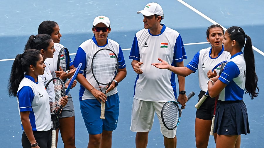 <div class="paragraphs"><p>Captain Vishal Uppal and coach Radhika Kanitkar (centre) interact with the Indian team during the practice session for the Billie Jean King Cup at SM Krishna Tennis Stadium on Tuesday. </p></div>