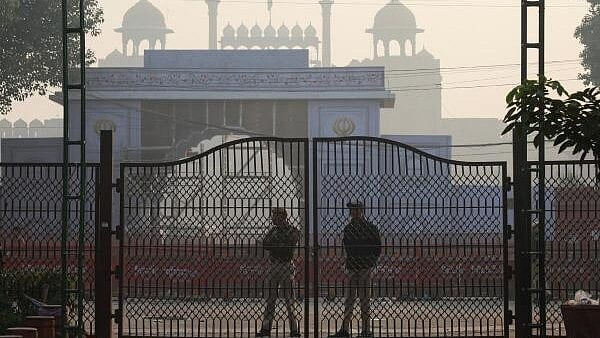 <div class="paragraphs"><p>Policemen stand guard at the site of an explosion near the historic Red Fort in the old quarters of Delhi.&nbsp;</p></div>