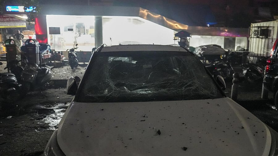 <div class="paragraphs"><p>A damaged vehicle at the blast site.&nbsp;</p></div>