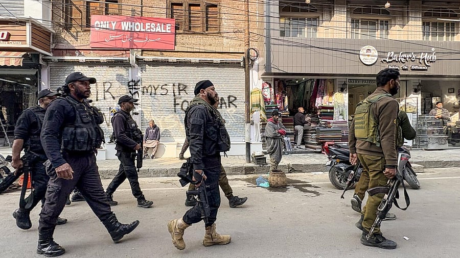 <div class="paragraphs"><p>Security personnel stand guard&nbsp; in Kashmir.</p></div>