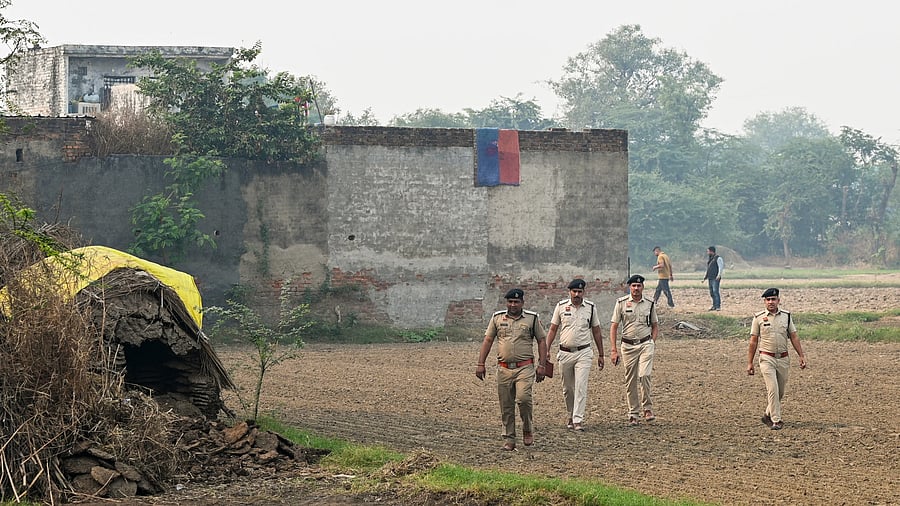 <div class="paragraphs"><p>Police officials during a search and cordon operation linked to an interstate and transnational terror module at Fatehpur Taga village in Faridabad district Haryana </p></div>