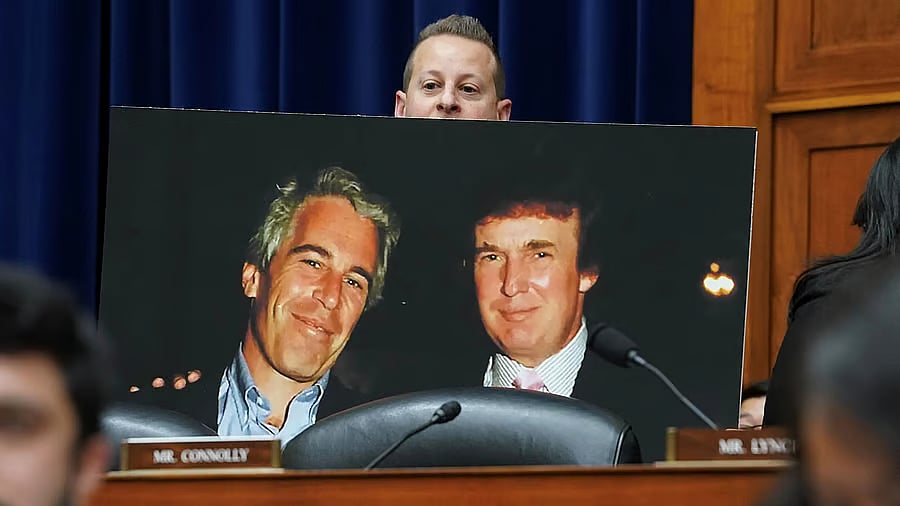 <div class="paragraphs"><p>Rep Jared Moskowitz holds up a<br> photo of former President Donald Trump with late sex offender Jeffrey Epstein.<br></p></div>