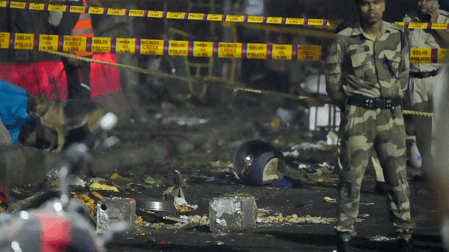 <div class="paragraphs"><p>The blast took place in a slow-moving car at a traffic signal near Gate No. 1 of the Red Fort Metro station on Monday evening, killing at least 12 people and gutting several vehicles.</p></div>