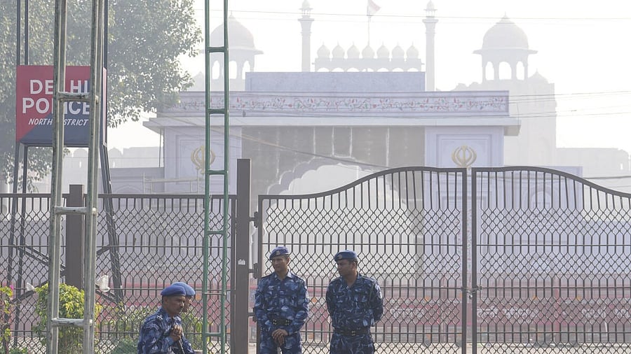 <div class="paragraphs"><p>Security personnel in a cordon off area near Red Fort after a blast on Monday that claimed the lives of 12 people and injured several, in New Delhi.</p></div>