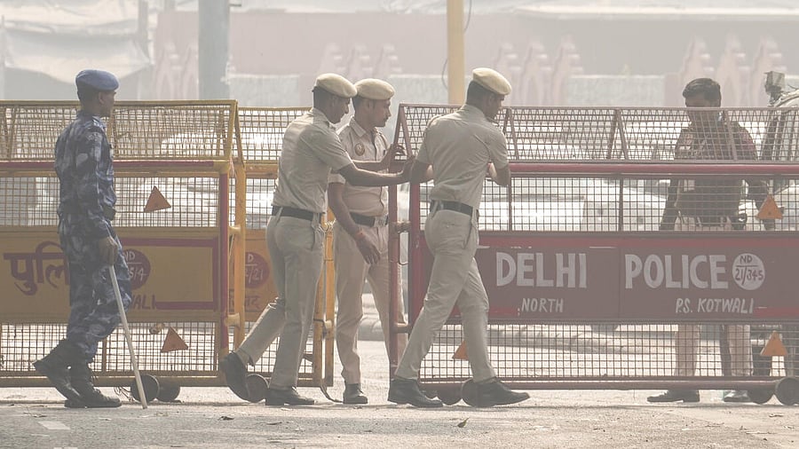 <div class="paragraphs"><p>Security personnel cordon off an area near Red Fort after a blast on Monday that claimed the lives of 12 people and injured several, in New Delhi.</p></div>
