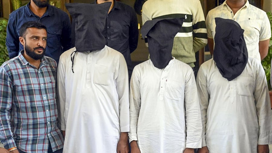 <div class="paragraphs"><p>Three persons, including a doctor, who were arrested by the Gujarat Anti Terrorist Squad (ATS). </p></div>