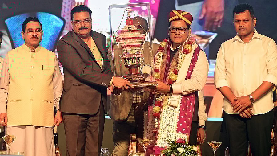 <div class="paragraphs"><p>Union Minister for Ports, Shipping and Waterways Sarbananda Sonowal is felicitated during the golden jubilee celebrations of New Mangalore Port Authority, in Panambur on Thursday. Union Minister Pralhad Joshi is also seen. </p></div>