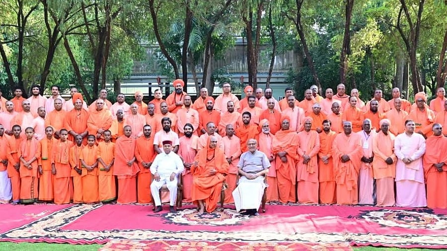 <div class="paragraphs"><p>Vice-President of India C P Radhakrishnan with seers of Veerashaiva Lingayat Mutts of Mysuru and Chamarajanagar districts at the Mysuru branch of Suttur Mutt, in Mysuru, on Sunday. </p></div>