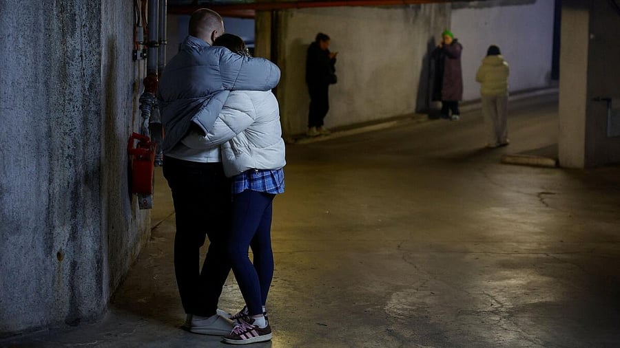 <div class="paragraphs"><p>People take shelter inside an underground parking lot during Russian missile and drone strikes, amid Russia's attack on Ukraine, in Kyiv.</p></div>