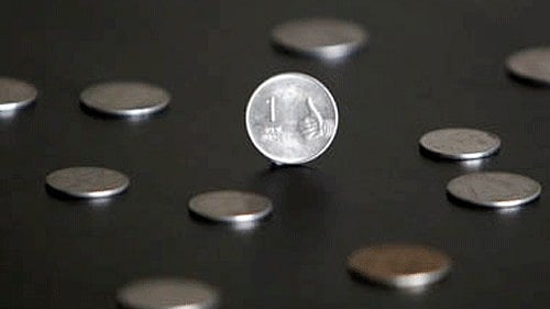 <div class="paragraphs"><p>At the interbank foreign exchange market, the&nbsp;rupee&nbsp;opened at 88.70 against the US dollar before dropping to 88.75, down 5 paise from its previous close.&nbsp;</p></div>