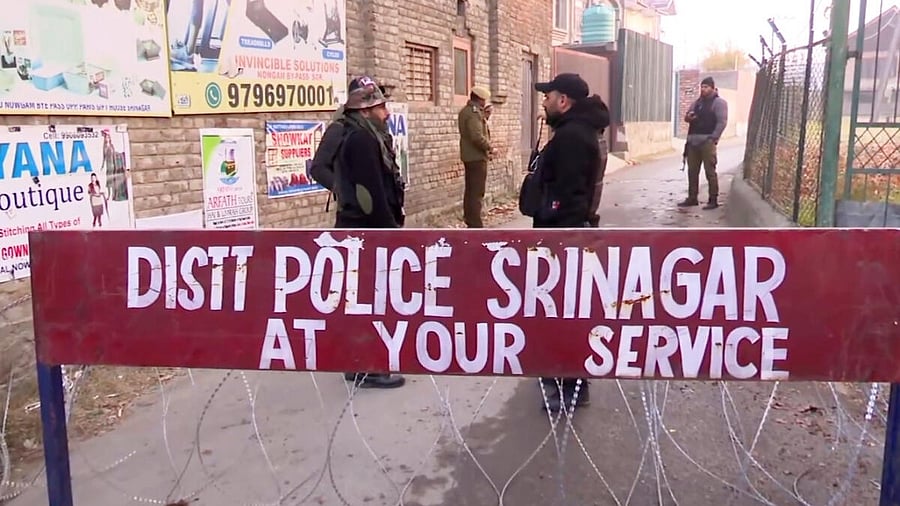 <div class="paragraphs"><p>Security personnel keep vigil after an accidental explosion ripped through Nowgam police station on late Friday night, in Srinagar.</p></div>