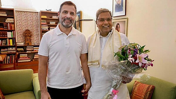 <div class="paragraphs"><p>Congress leader Rahul Gandhi with Karnataka Chief Minister Siddaramaiah.</p></div>