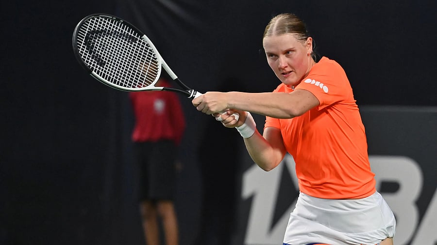 <div class="paragraphs"><p>Netherlands Suzan Lamens returns during her win over India's Sahaja Yamalapalli in the Billie Jean King Cup at the SM Krishna Tennis Stadium on Sunday. </p></div>