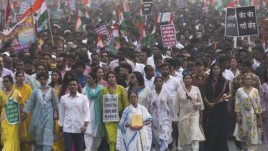 <div class="paragraphs"><p>West Bengal Chief Minister and TMC supremo Mamata Banerjee with the party's General Secretary and MP Abhishek Banerjee and other party leaders takes part in a protest rally against the Special Intensive Revision (SIR) of electoral rolls in the state, in Kolkata.</p></div>