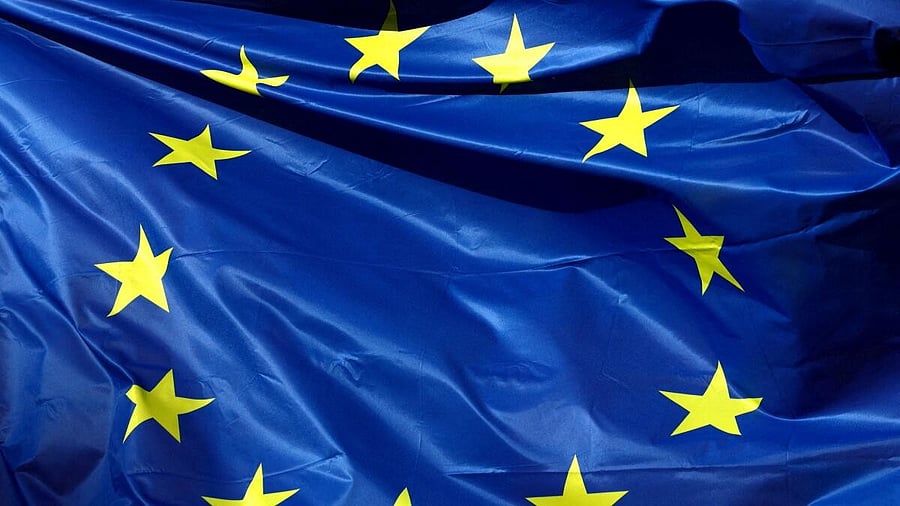 <div class="paragraphs"><p>A European Union flag flutters outside the EU Commission headquarters, in Brussels, Belgium.</p></div>