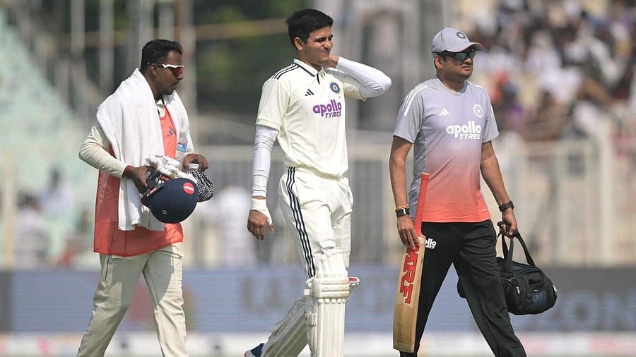 <div class="paragraphs"><p>Shubman Gill grimaces in pain after hurting his neck during Kolkata Test.</p></div>