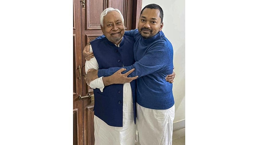 <div class="paragraphs"><p>Bihar Chief Minister Nitish Kumar with his son Nishant Kumar at his official residence, in Patna.</p></div>