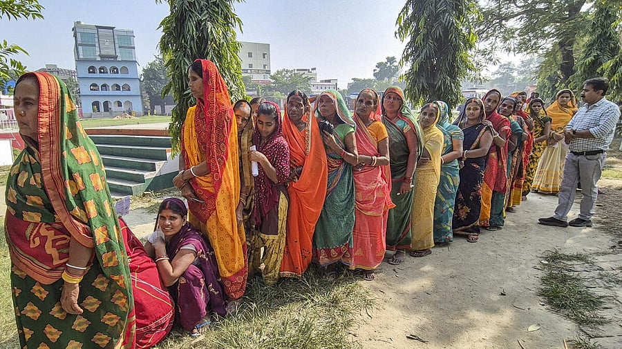 <div class="paragraphs"><p>Women voters wait in a queue to cast votes at a polling station during the first phase of the Bihar Assembly elections.</p></div>